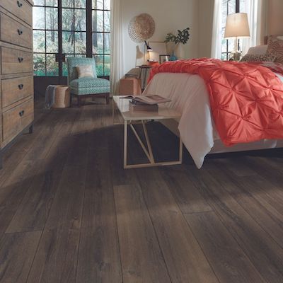 luxury vinyl plank floors in a cozy bedroom